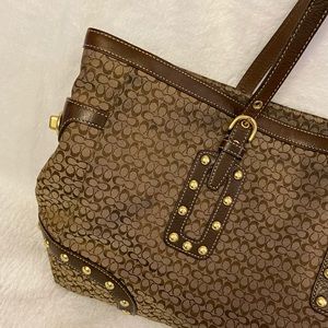 Genuine Coach Handbag w/ signature monogram logo.